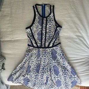 Fitted Parker dress. Blue and white pattern with black detail